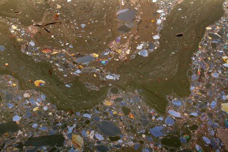 The polluted surface of the Gowanus Canal. Photo: William Miller http://www.psfk.com/2013/03/gowanus-canal-pollution-photos.html