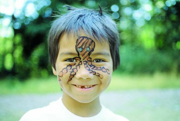 Face-painting at a CRD interpretive event.  Photo: CRD Image Library.