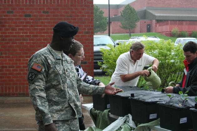 Fort Drum army soldiers and wives participating in a distance-gardening activity, coordinated by members of Cornell’s Civic Ecology Lab and Jefferson County Cornell Cooperative Extension.