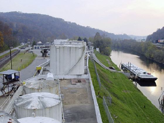 Freedom Industries site on the Elk River where the chemical spill occurred. The intake for West Virginia American Water, which supplies water to 300,000 people in the Charleston area, is 1.2 km downstream, in the distant upper left. Photo obtained at http://inhabitat.com/huge-chemical-spill-leaves-30000-without-drinking-water-in-west-virginia/