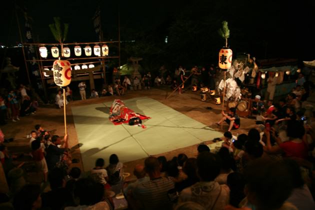 Dragon dancing on the eve of Megijima's Matsuri festival. Photo: Suhee Kang