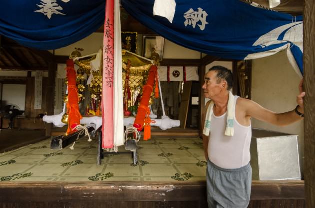 One of the town elders watching over the temple before the Matsuri festival. Photo: Patrick M. Lydon 