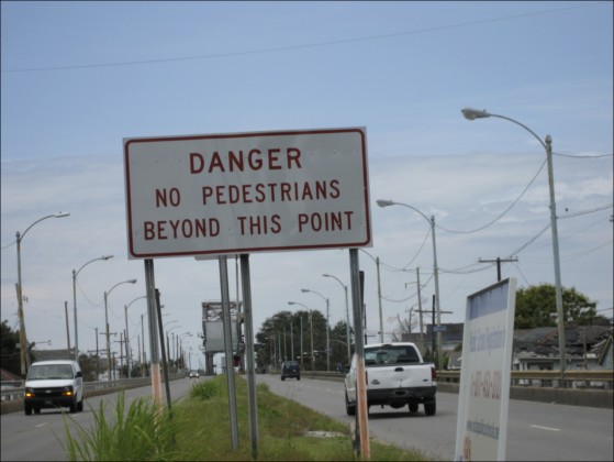 Shot from Nola bridge obstructing access to the Lower 9th Ward: no pedestrians beyond this point. Photo: Mary Rowe