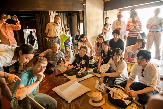 Programmer Johann Barbie, showing our work to locals during a regional sustainable farming symposium which we initiated as artists in Megijima, Japan. Photo: Patrick Lydon