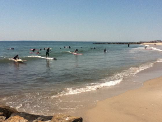 Beginner surfers in Rockaway Beach. Photo: Bryce DuBois