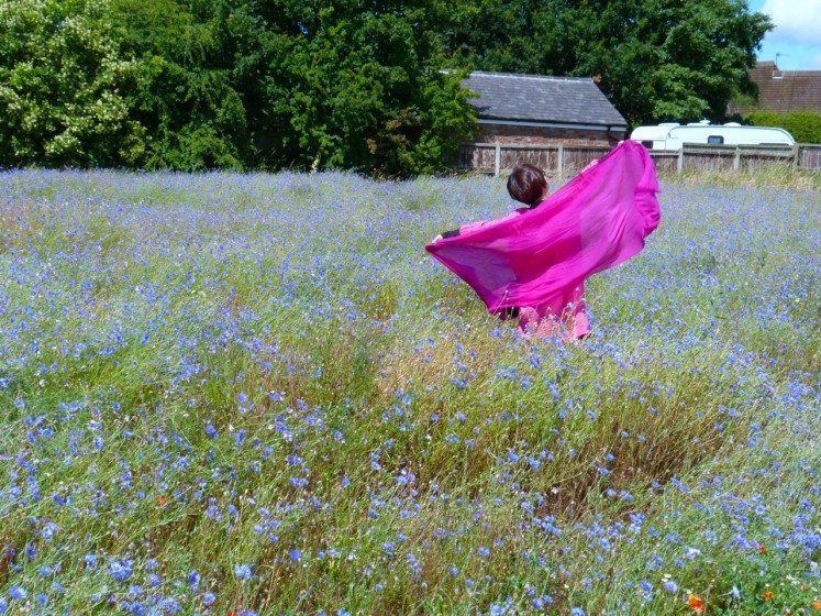 Mrs Zhou Director of a Chengdu engineering company dancing spontaneously in one of Landlife’s fields