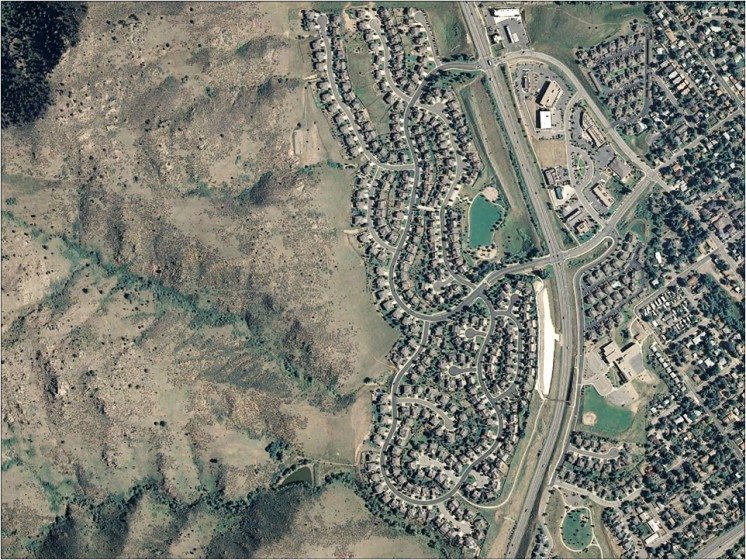 Aerial photo of development in the foothills of Colorado. Nearby development can have significant impacts on the biological integrity of natural areas. Photo: Sarah Reed