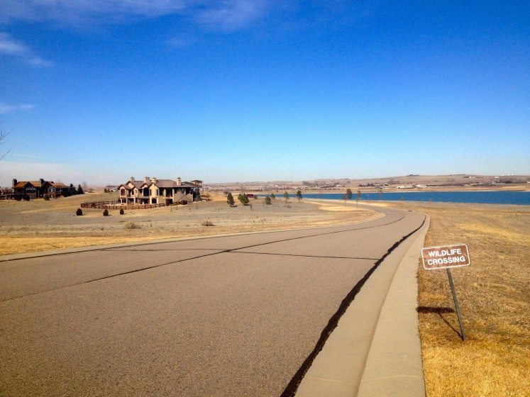 A small wildlife crossing sign in a Colorado conservation development.  Photo: Daniel Feinberg