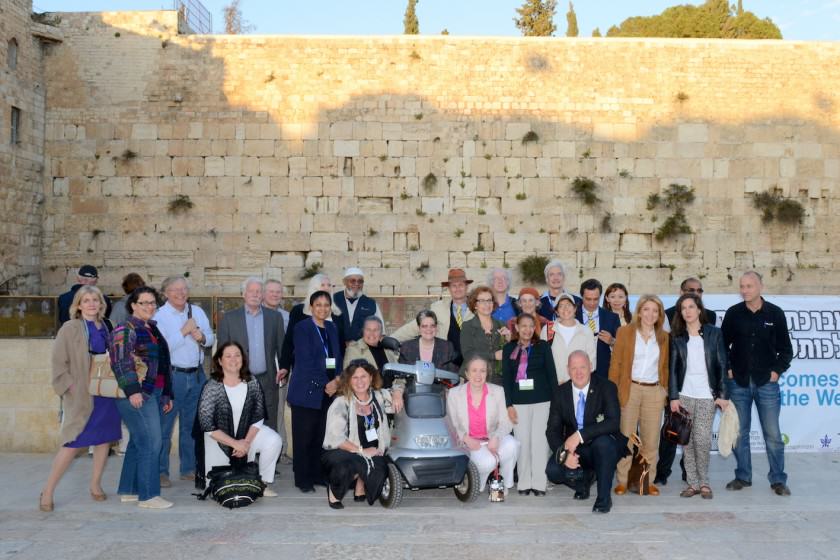 The above picture was taken at the closing ceremony of the International Jerusalem Symposium on Green and Accessible Pilgrimage. At the event we welcomed the swifts, who are only a few of half a billion birds that fly over Jerusalem twice a year on their migration route, following the Afro-Syrian Rift Valle. They stop over in Jerusalem for mating, rest and recreation. 88 pairs of swifts nest in ancient crevices in the Western wall, and the picture below this shows a closer view of a swift about to enter its nest. They seem to be keen on interfaith pilgrimage, since some of our swifts prefer to pray at the Church of the Holy Sepulchre, while others pray in the Great Mosque.  