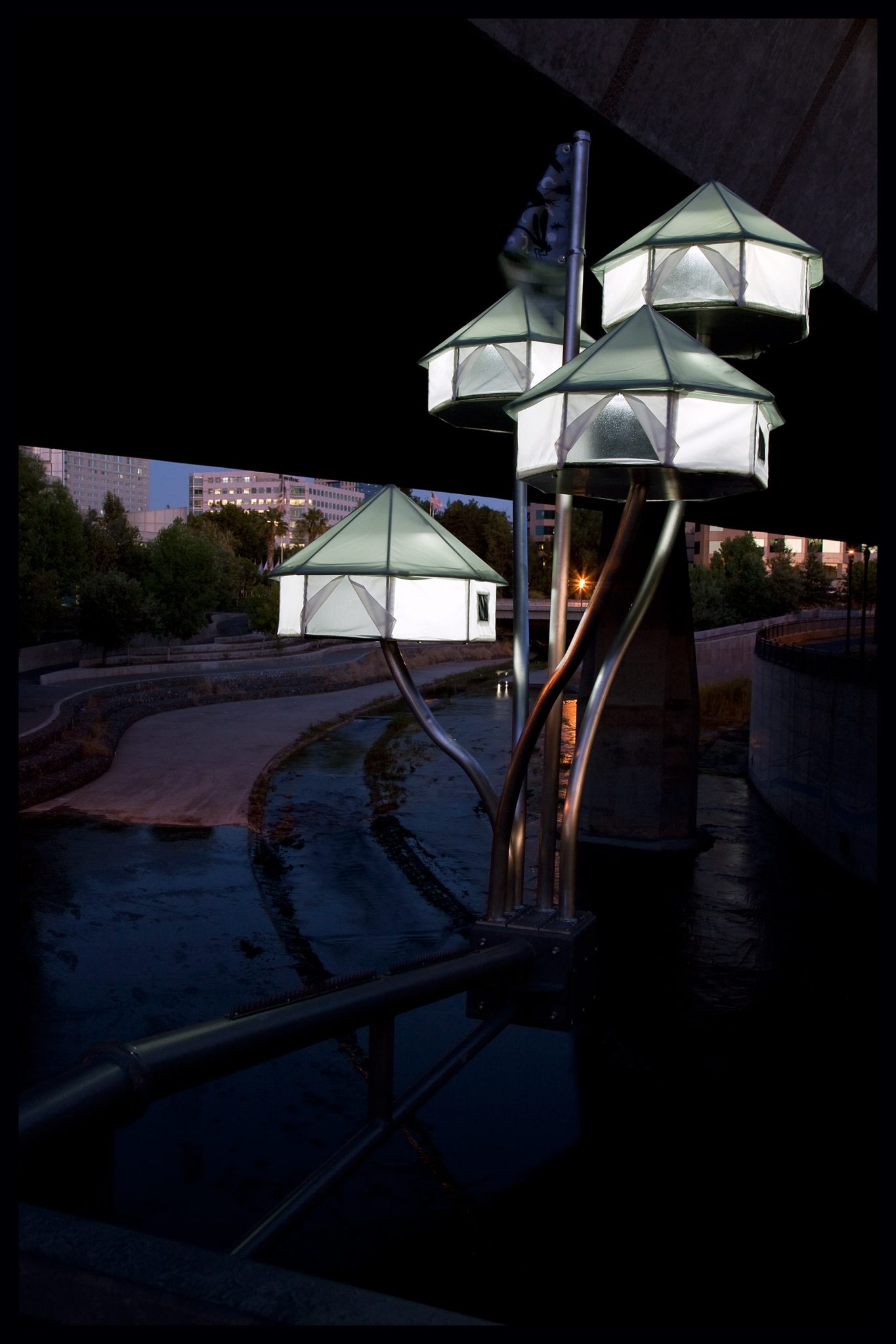 Floating World White Tents at Night. Work by Robin Lasser and Marguerite Perret. Photo by Robin Lasser