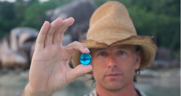 J Nichols with blue marble