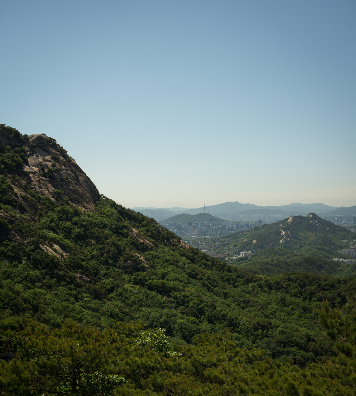 Several mountains with a clear sky