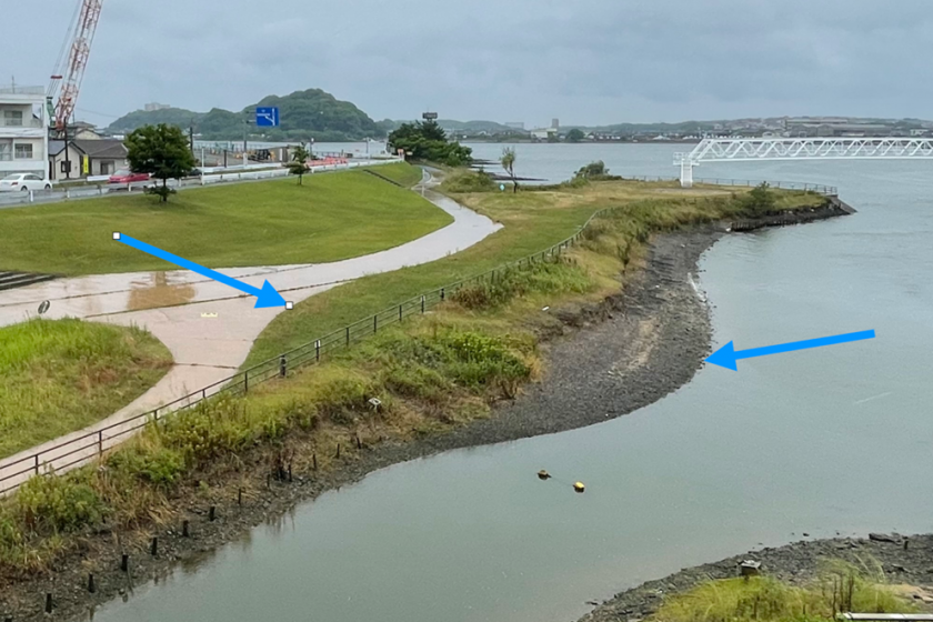 A picture of a river and a walkway