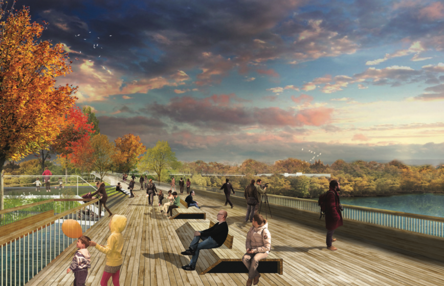 A picture of a boardwalk with people standing, sitting, and milling about