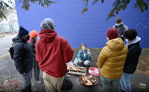 A group of people around a fire