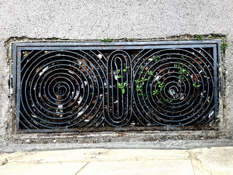 A picture of a mural depicting two spirals