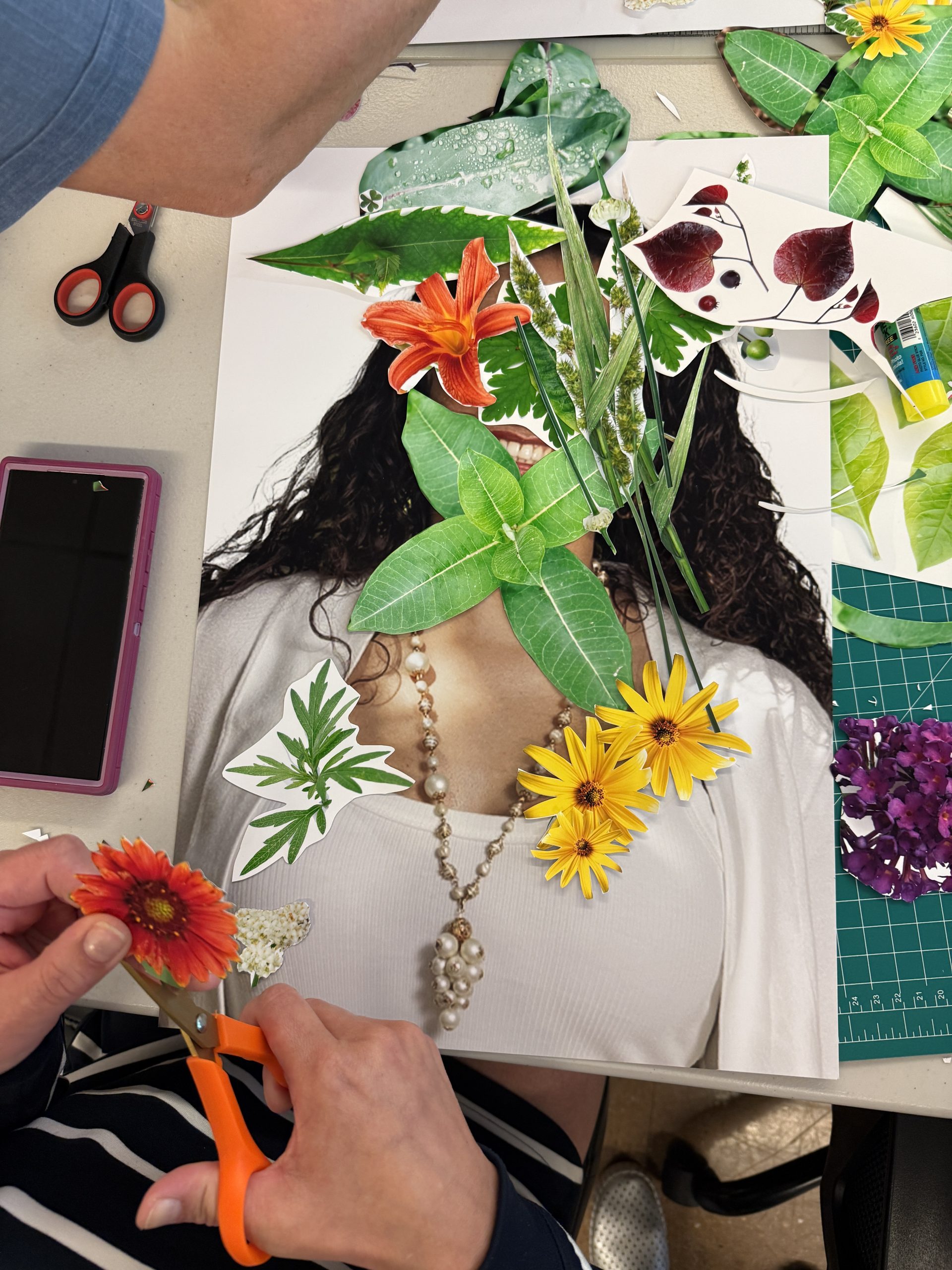 A person cutting flowers on a picture