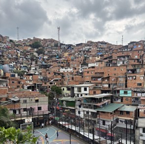 A group of brown and white buildings in a city