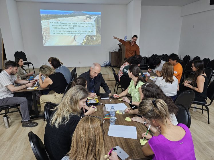 A group of people sitting around a table