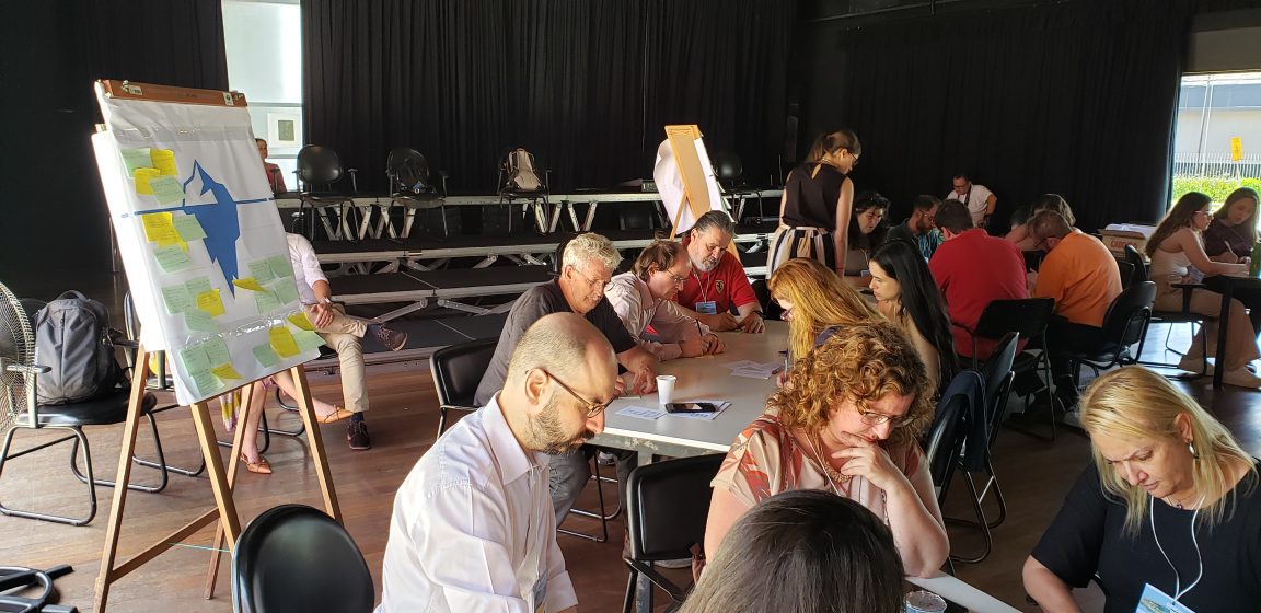 A group of people sitting at a table
