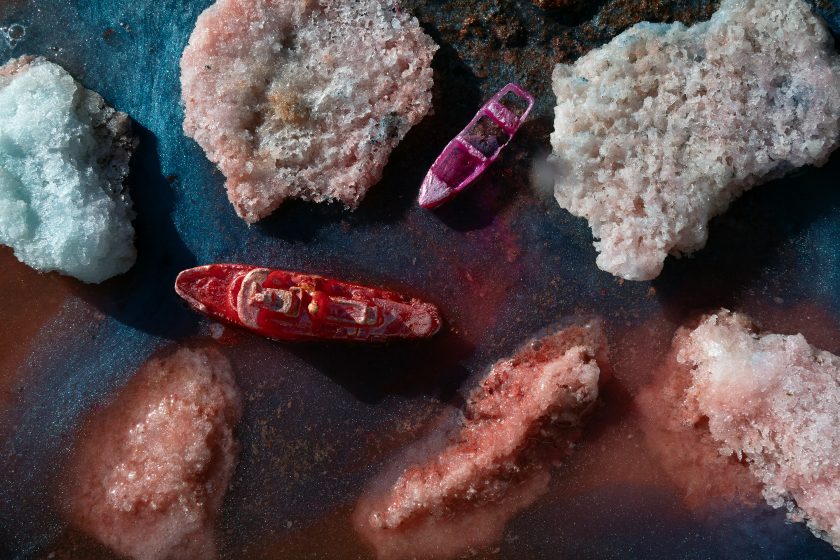 Crystals made to look like boats passing the shore