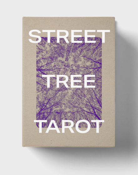 Photo of a tarot card box featuring a top-down view of tree branches in purple tones. White bold text overlays image, reading "STREET TREE TAROT".
